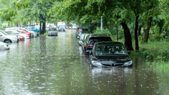 Flooded cars parked on street